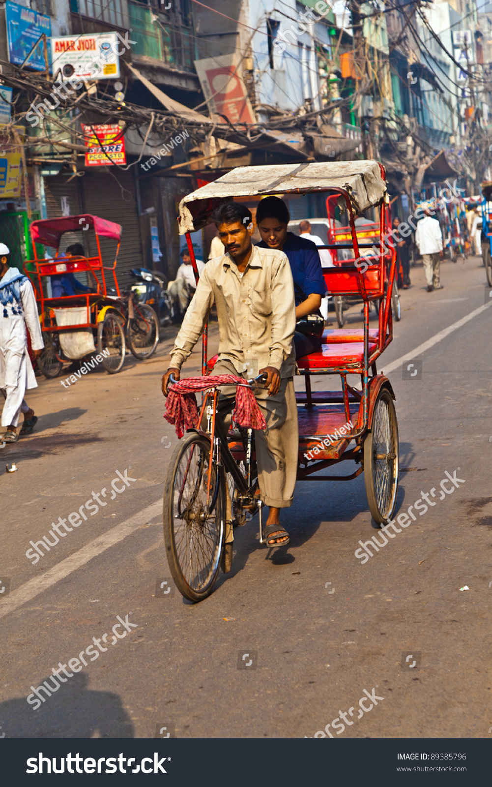 Delhi, India - Nov 9: Rickshaw Rider Transports Passenger Early Morning ...