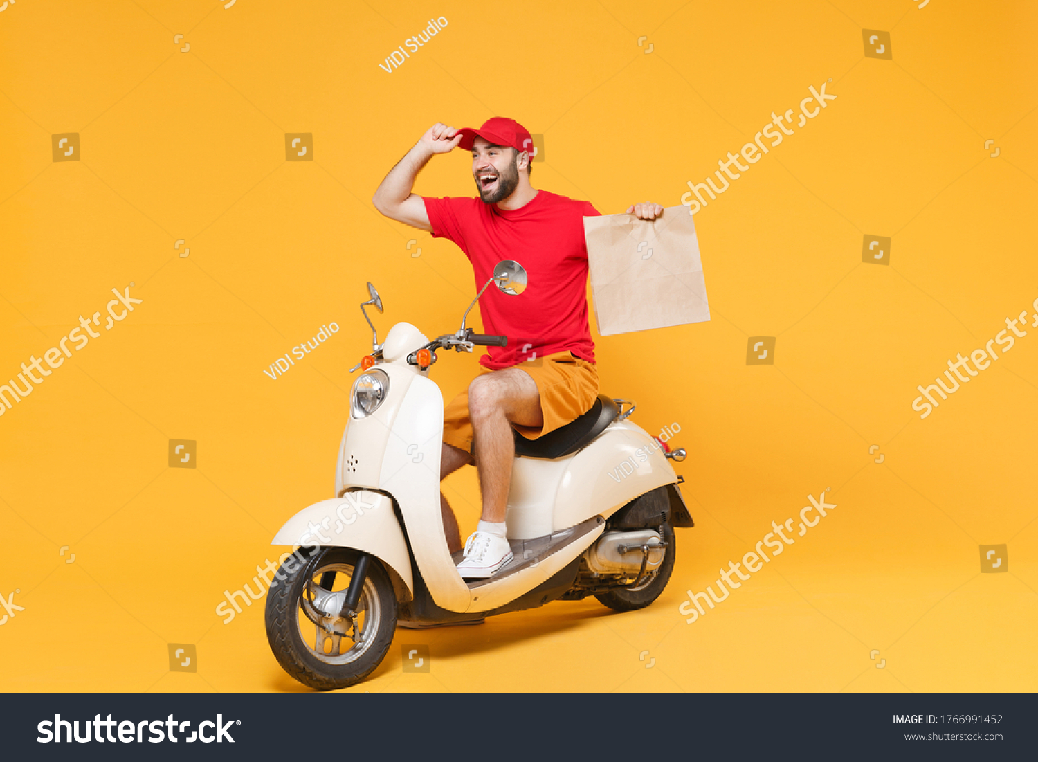 Delivery Man Red Cap Tshirt Uniform Stock Photo (Edit Now) 1766991452