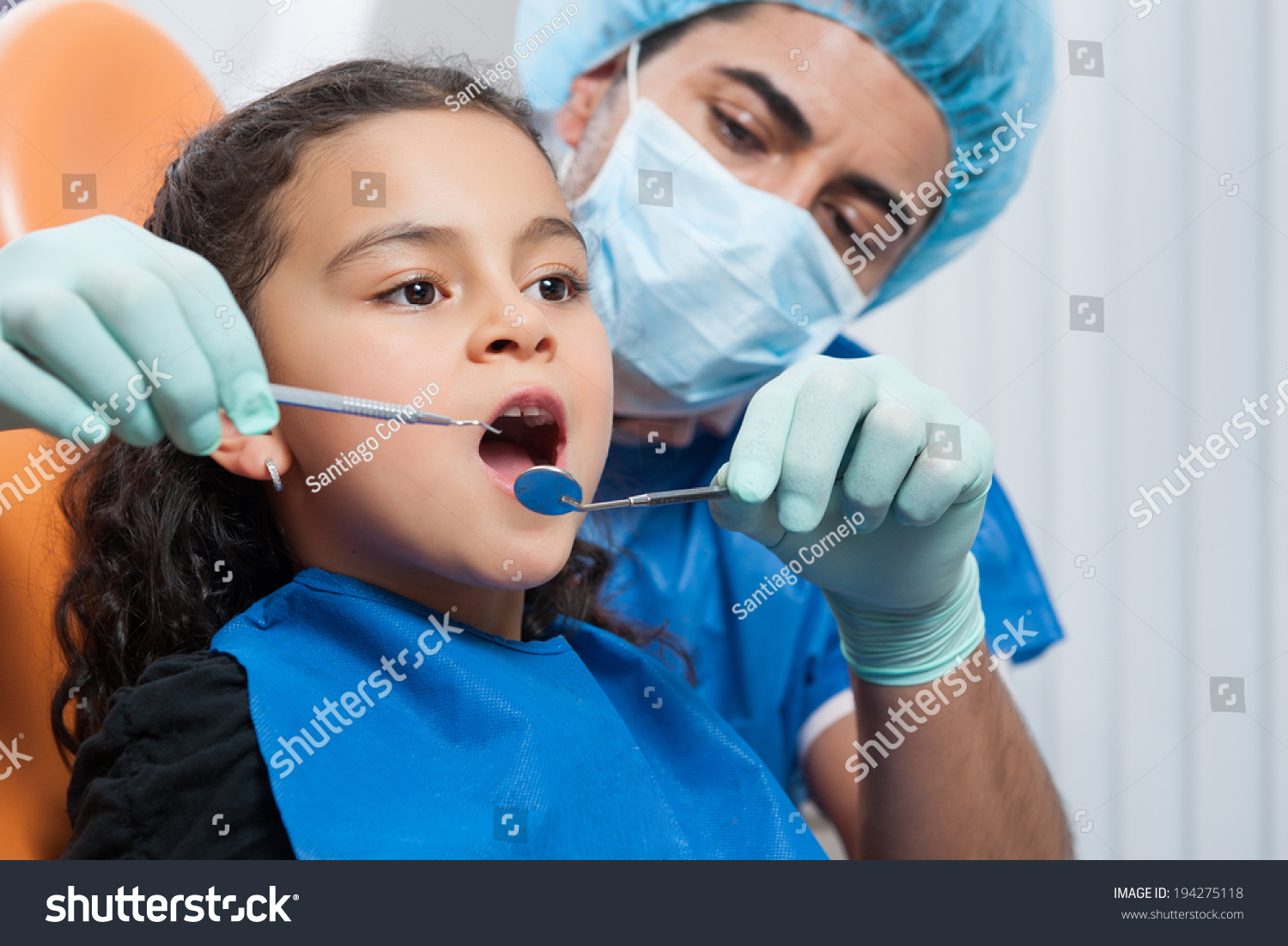 Dentist Examining Child Patient'S Mouth In Clinic Stock Photo 194275118 ...