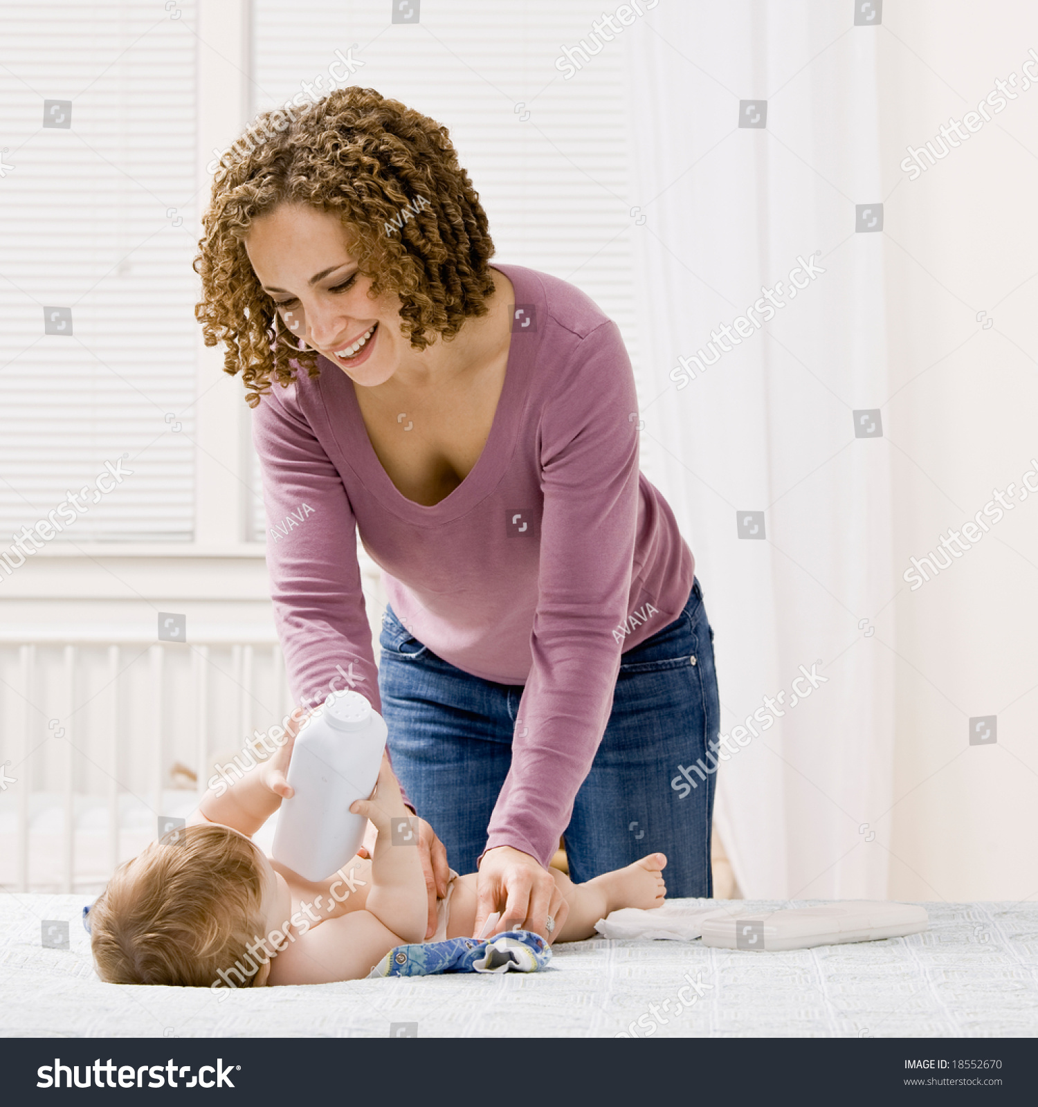 Devoted Mother Change Her Sons Diaper Stock Photo (Edit Now) 18552670