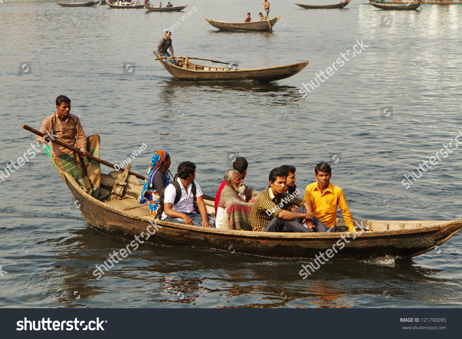 Dhaka, Bangladesh - December 14: Boatmen Ferry Passengers Across A ...