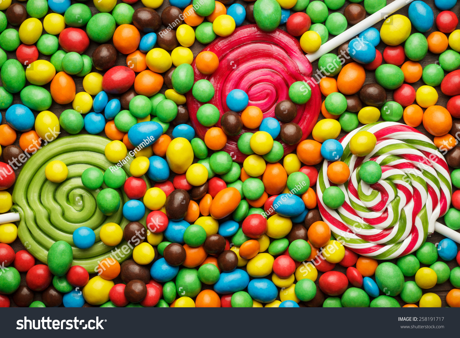 Different Colorful Sweets And Lollipops On The Table Stock Photo ...