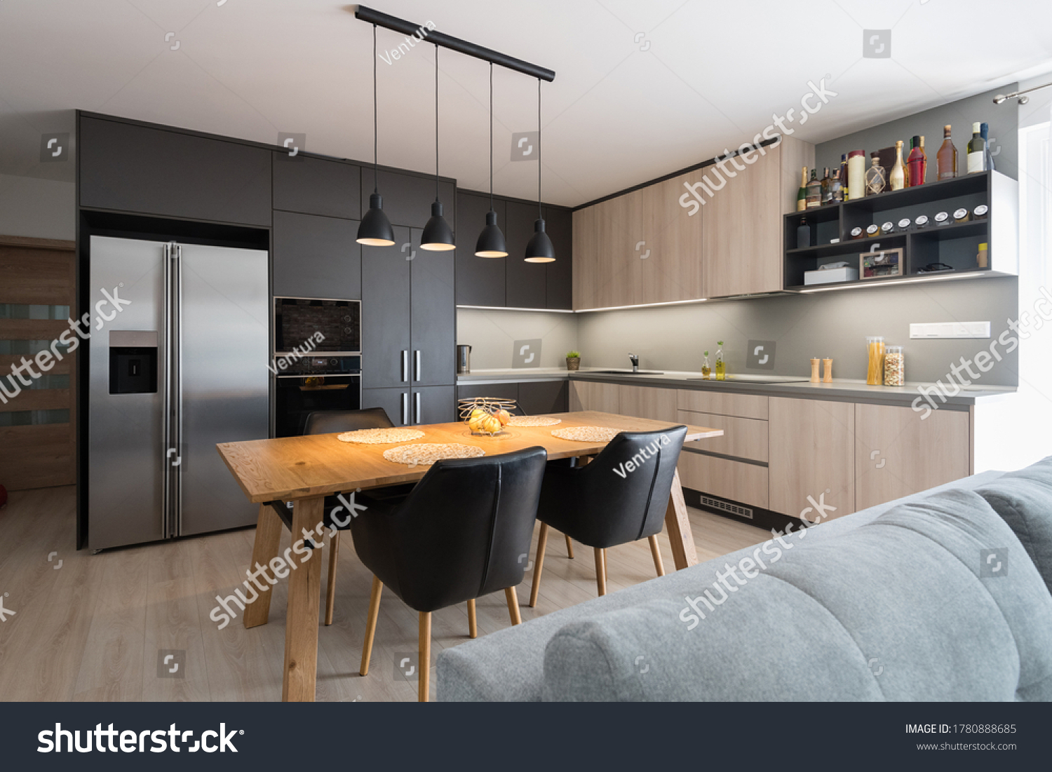 stock-photo-dining-table-in-kitchen-of-modern-house-1780888685.jpg