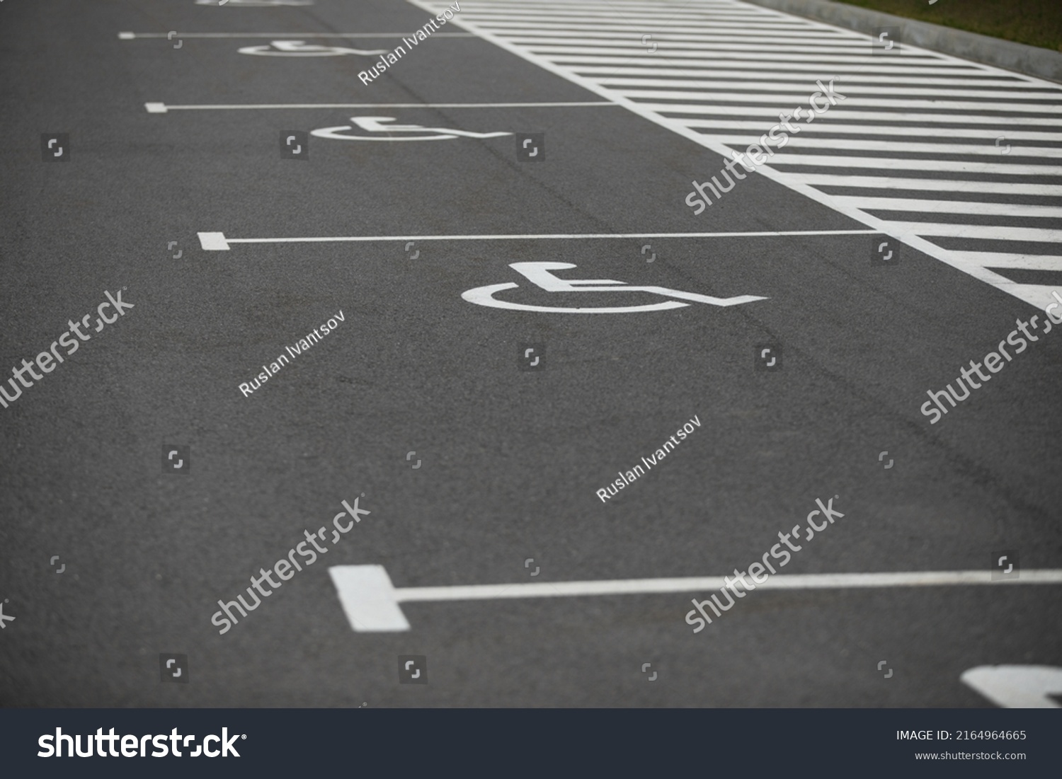 Disabled Parking Space View Accessible Handicapped Stock Photo   Stock Photo Disabled Parking Space View Of Accessible Or Handicapped Parking 2164964665 