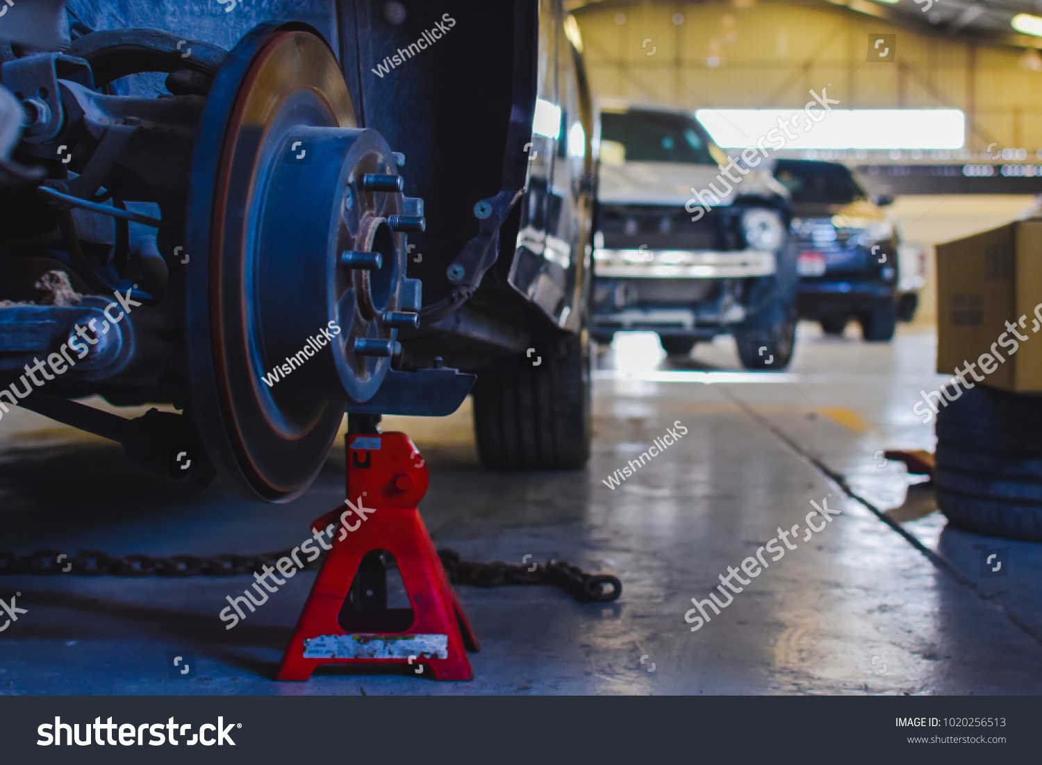 Disc Brake Pads Jacked Car Garage Stock Photo Edit Now 1020256513