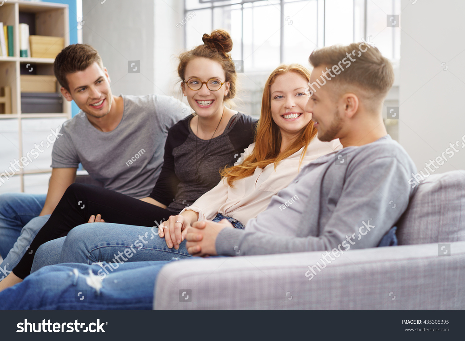 Discussion Between Four Friends Seated On Stock Photo 435305395 Discussion Between Four Friends Seated On Stock Photo 435305395