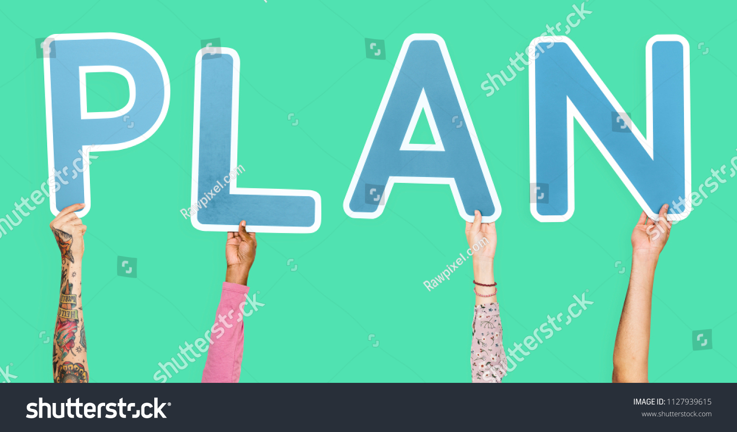 Diverse Hands Holding Word Plan Stock Photo 1127939615 | Shutterstock