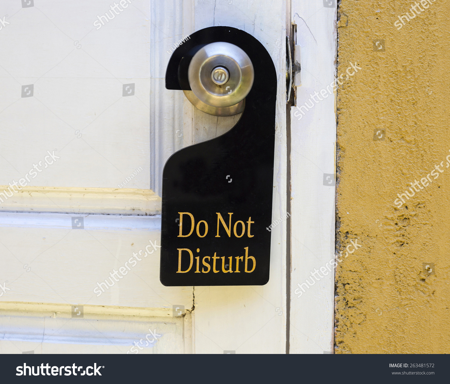 Do Not Disturb Sign Hang On Door Knob And Stone Wall. Stock Photo ...