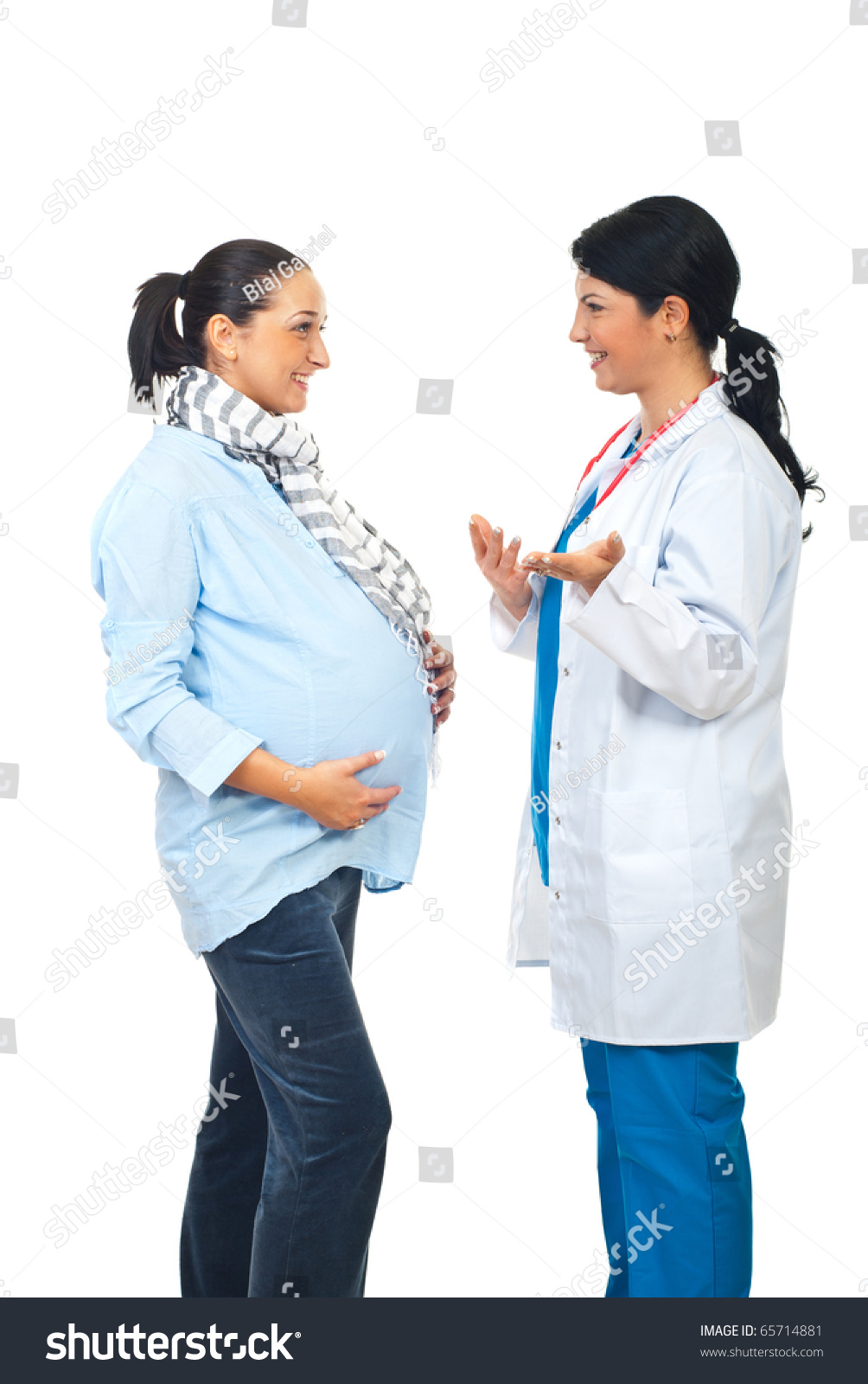Doctor Talking Pregnant Woman Giving Her Stock Photo 65714881