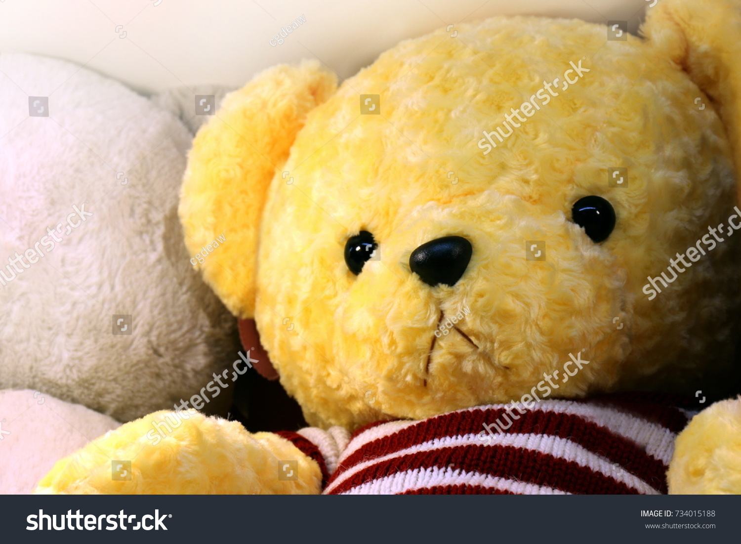 teddy bear with doll face