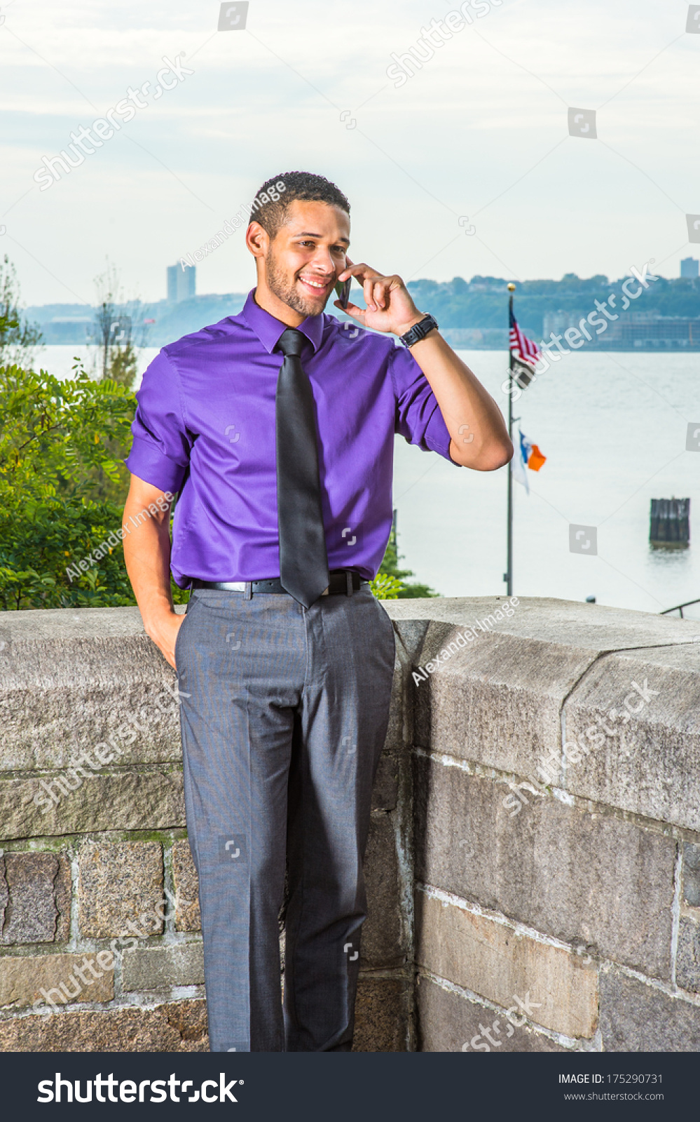 purple shirt and gray pants