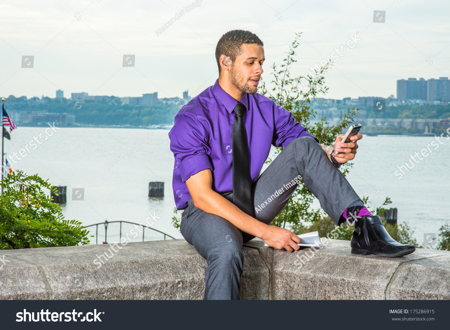 purple shirt gray pants