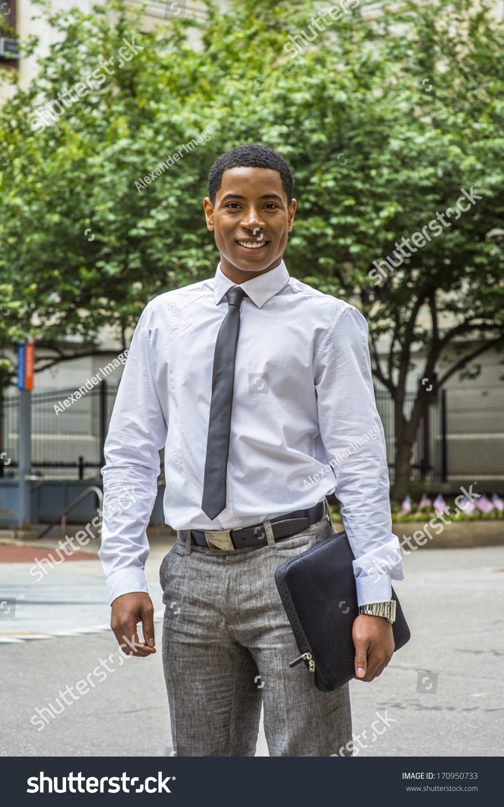 white shirt grey pants tie