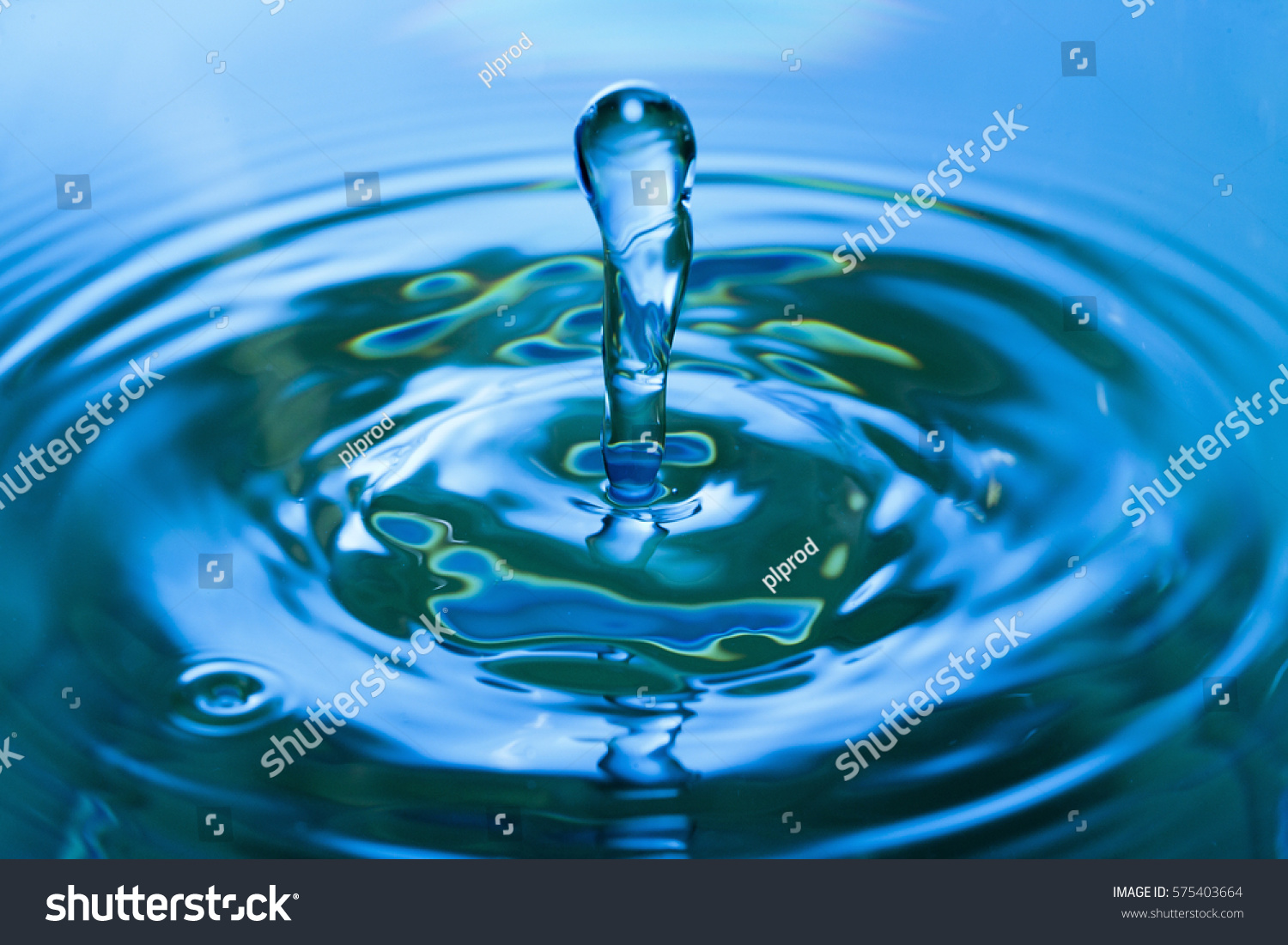 Drop Falling Into Blue Water Stock Photo 575403664 | Shutterstock