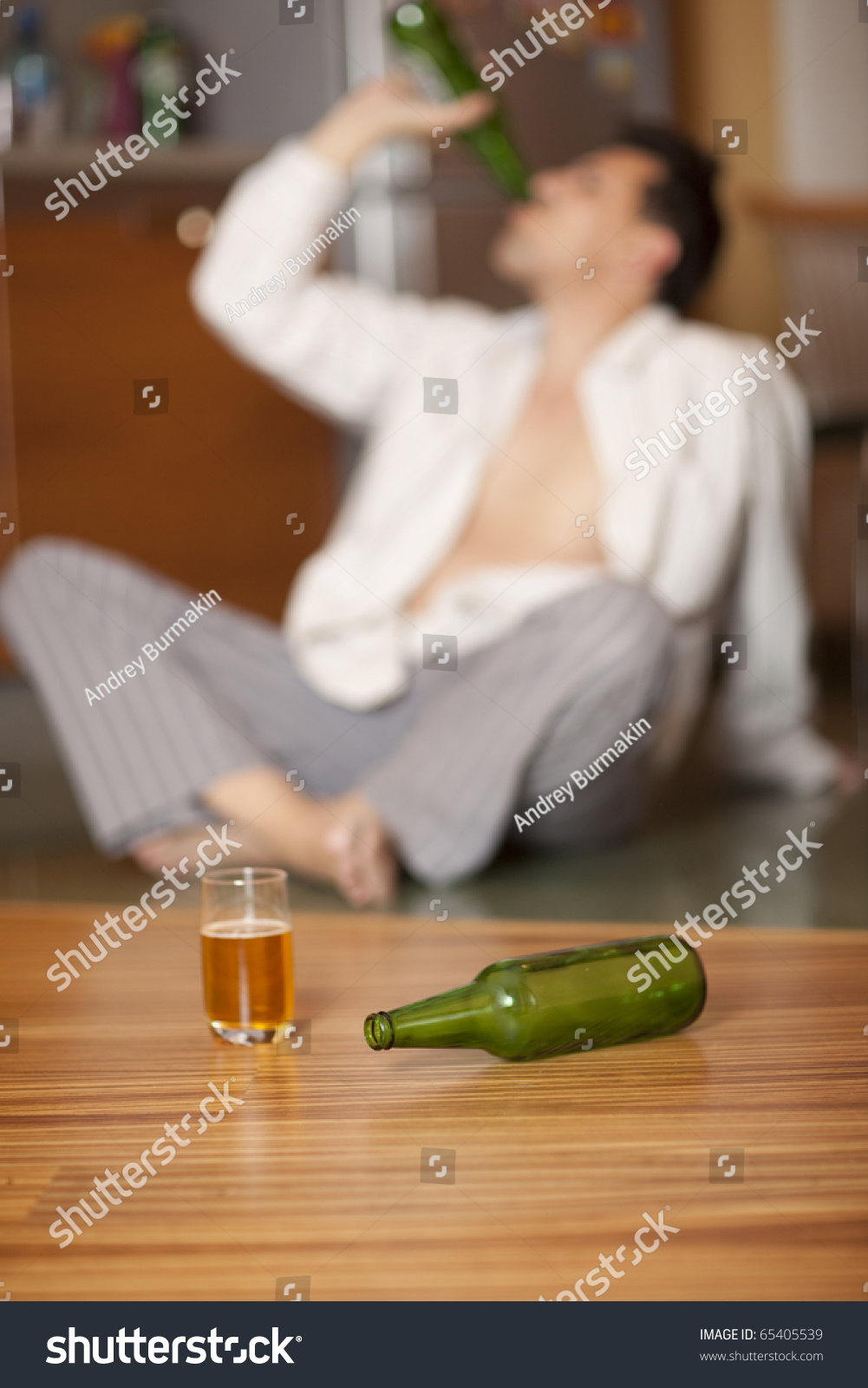 Drunkard. Man Drinking A Beer. Focus On Bottle Stock Photo 65405539 ...