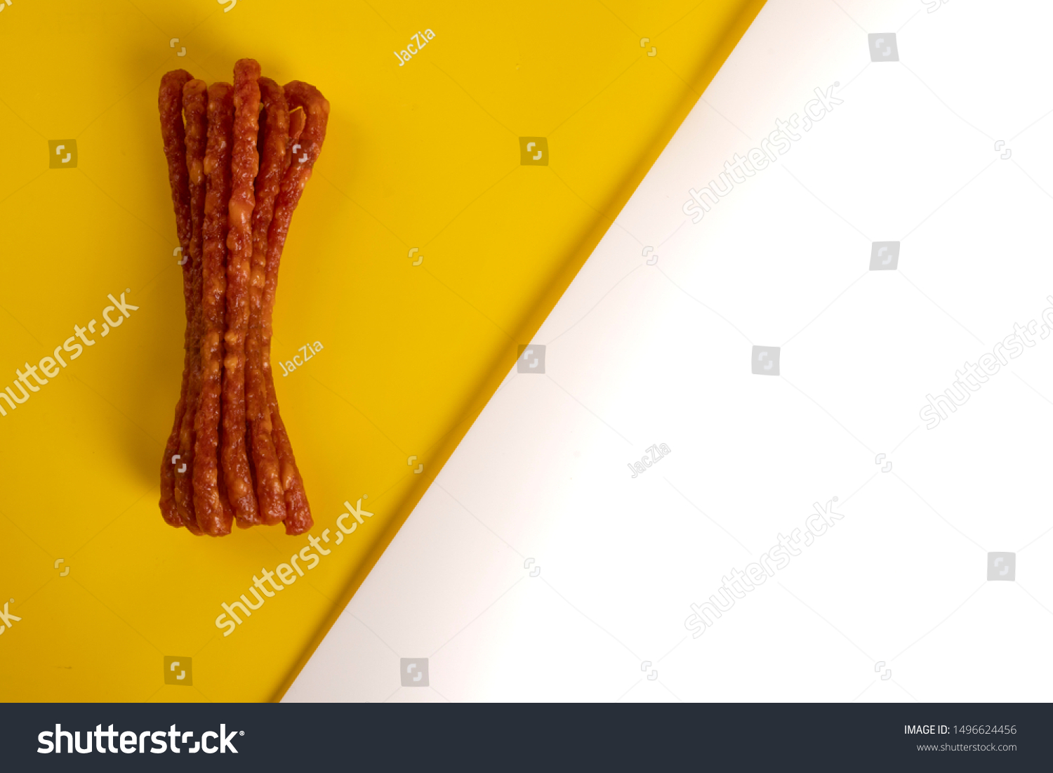 Download Dry Sausages Thin Sausages On Yellow Stock Photo Edit Now 1496624456 PSD Mockup Templates