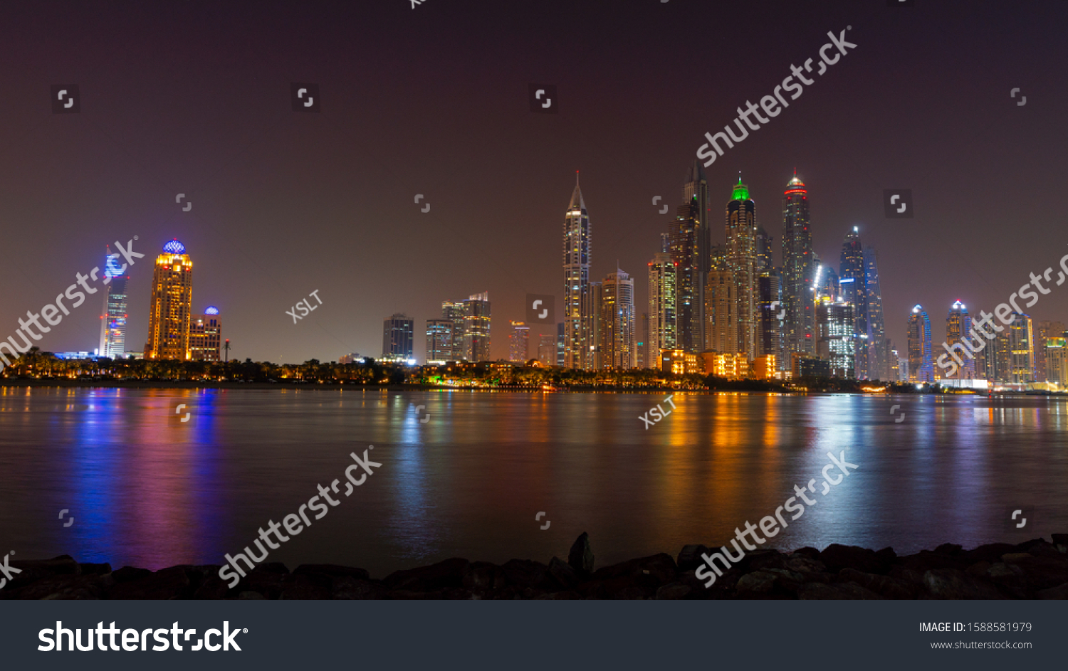 Dubai Skyline Night Lights On Water Stock Photo Edit Now