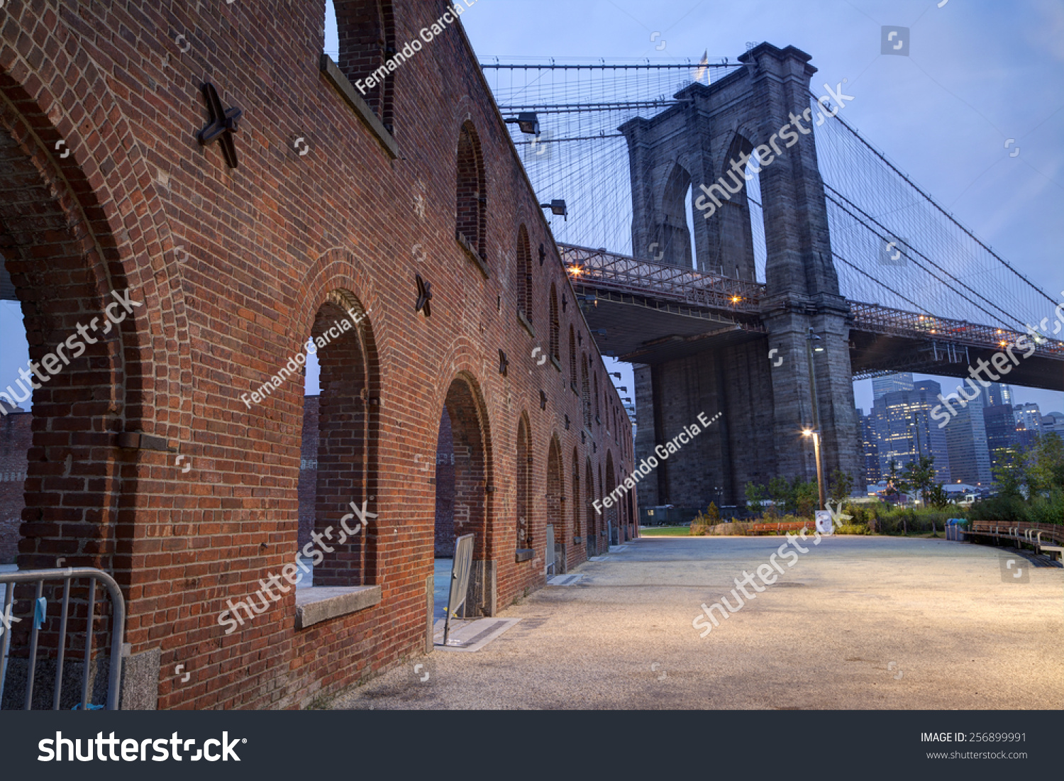 stock-photo-dumbo-brooklyn-new-york-july-brooklyn-bridge-tower-and-brick-wall-during-the-early-256899991.jpg