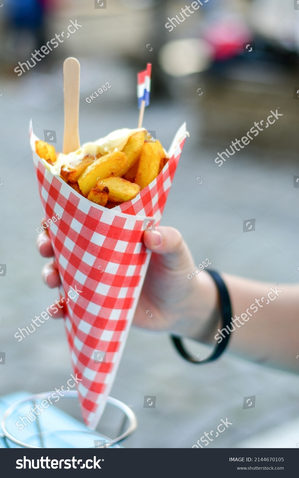 6 353 Dutch Fries Images Stock Photos Vectors Shutterstock   Stock Photo Dutch War Fries With The Canals Of Amsterdam On The Background Typical Dutch Street Food Hand 2144670105 