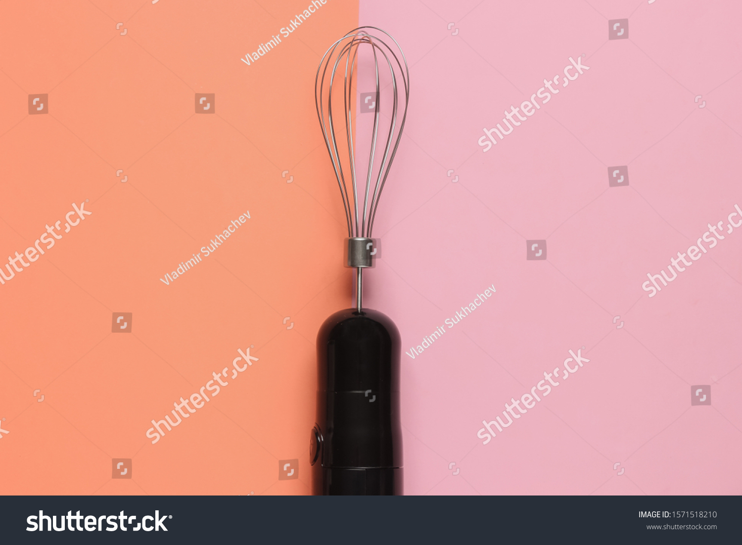 pink electric hand whisk