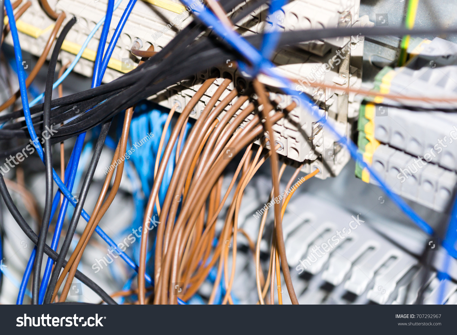 Electrical equipment components installation in fuse box. Wiring and connections.