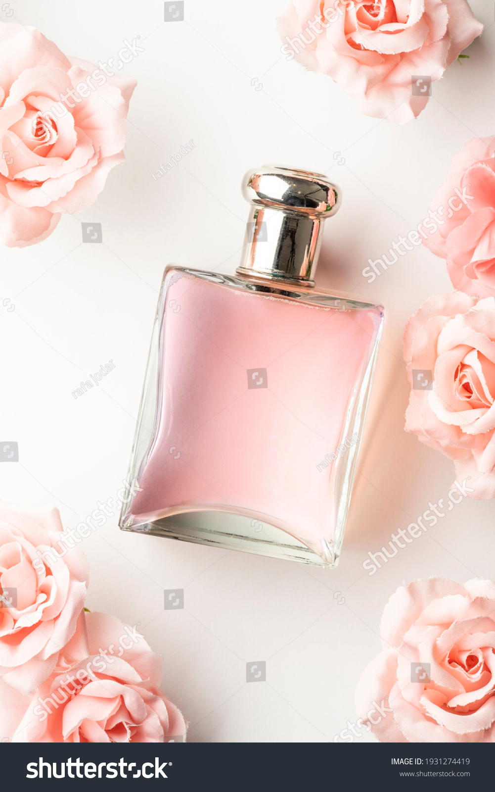 perfume with rose on bottle