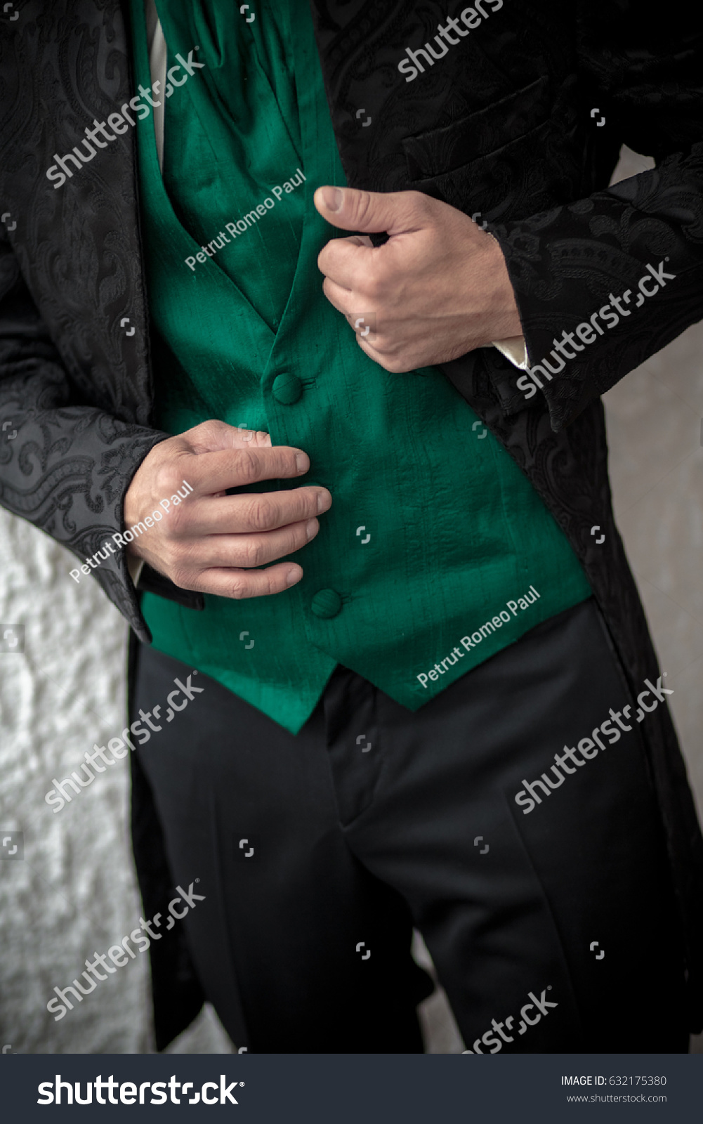 black suit green waistcoat