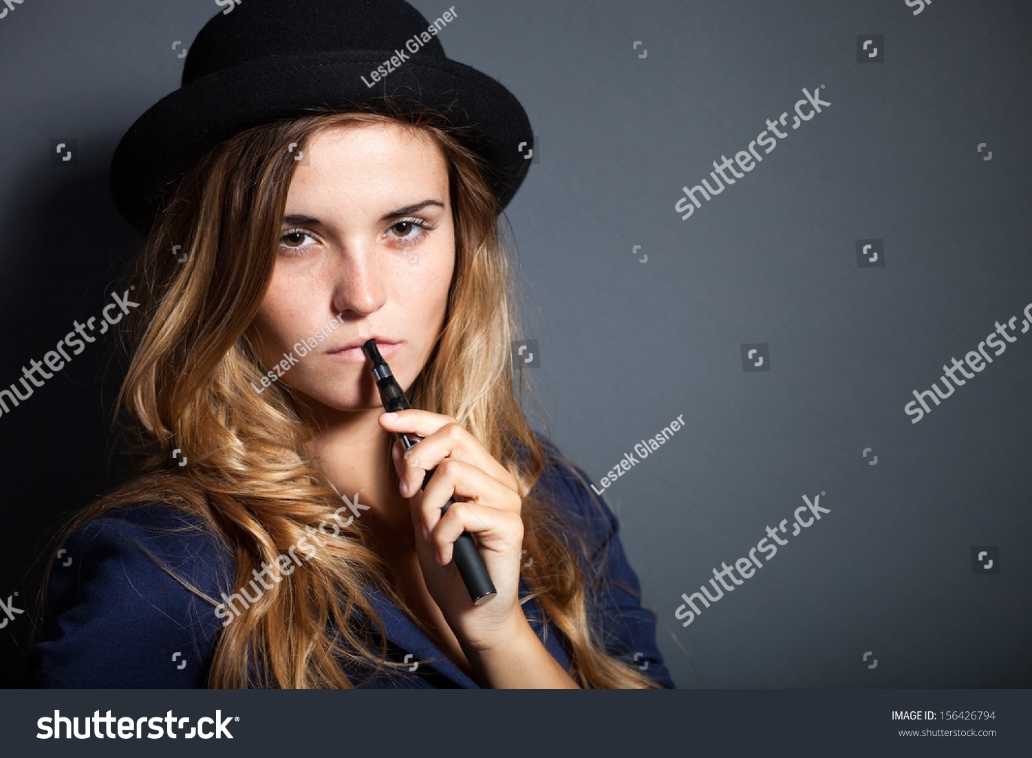 Elegant Woman Smoking Ecigarette Wearing Suit Stock Photo 156426794 ...