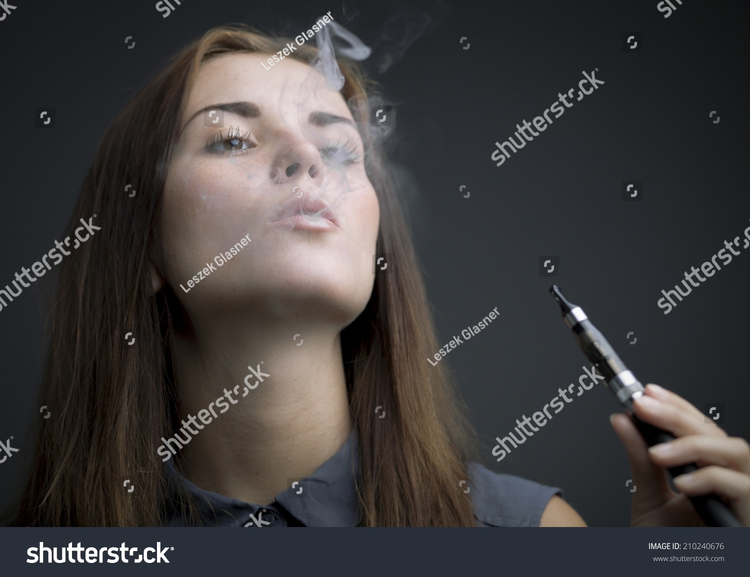 Elegant Woman Smoking Ecigarette Smoke Portrait Stock Photo 210240676 ...