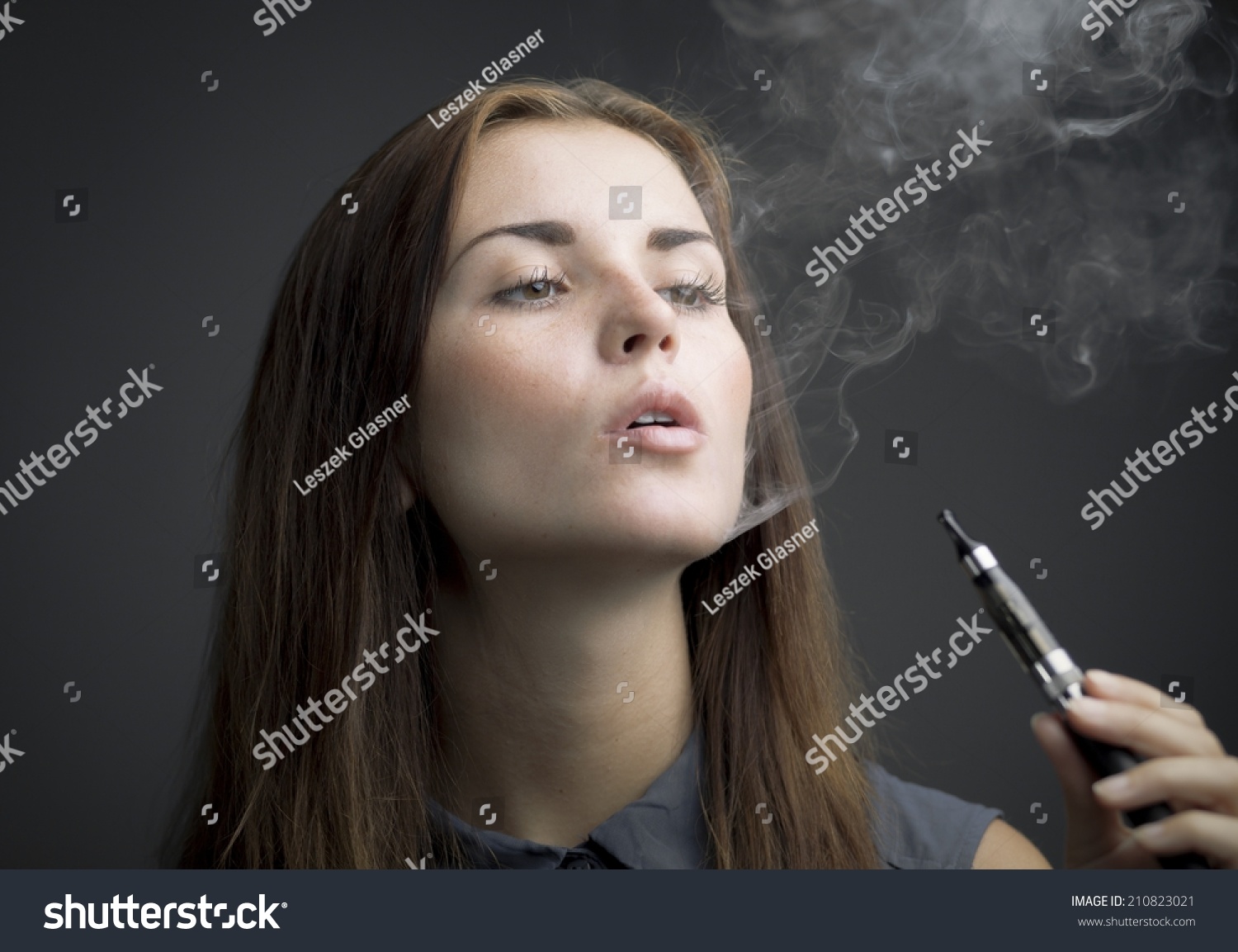 Elegant Woman Smoking Ecigarette Smoke Portrait Stock Photo 210823021 ...