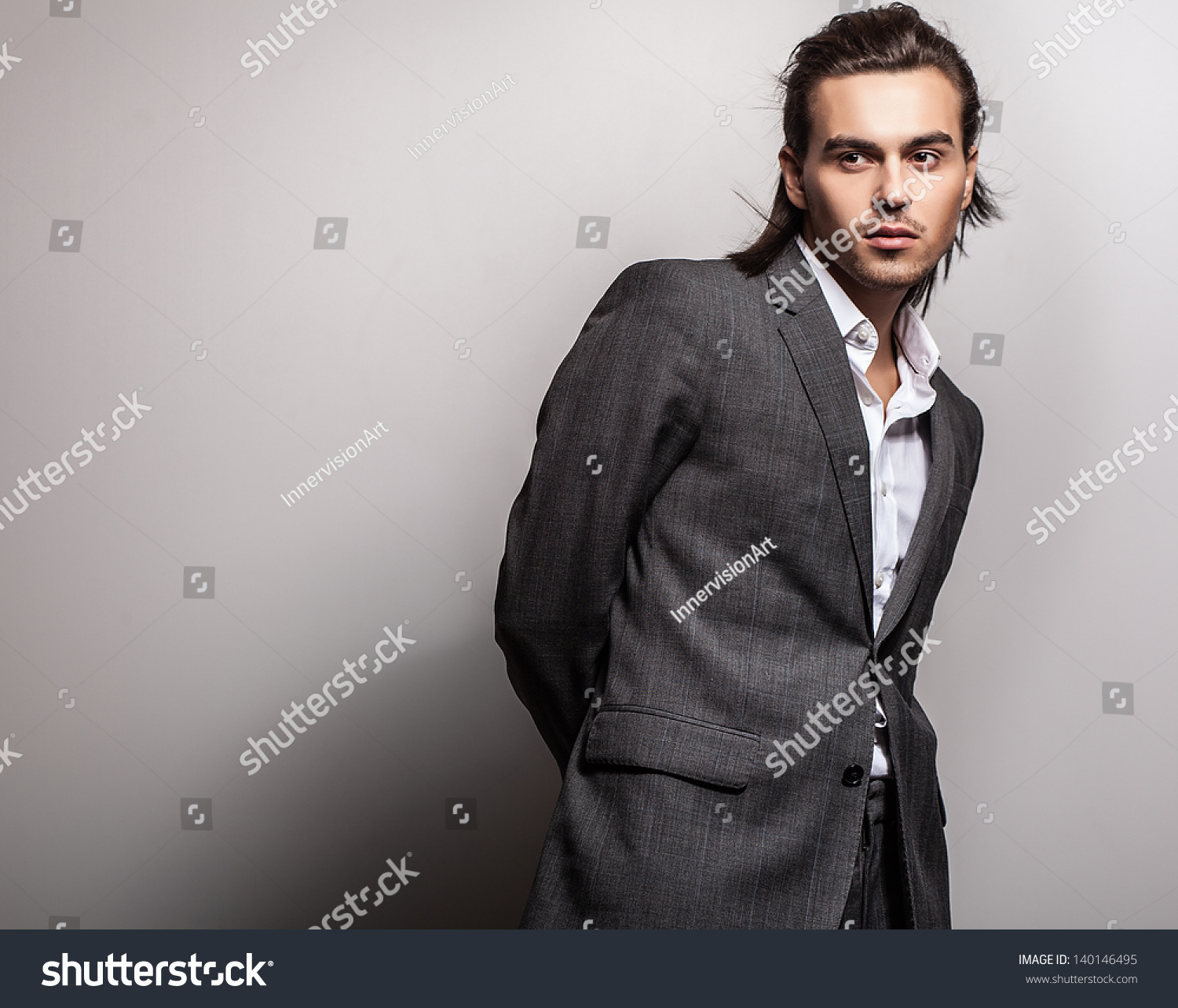 Elegant Young Handsome Long Haired Man In Costume Studio Fashion Portrait Stock Photo Elegant Young Handsome Long Haired Man In Costume Studio Fashion Portrait Stock Photo