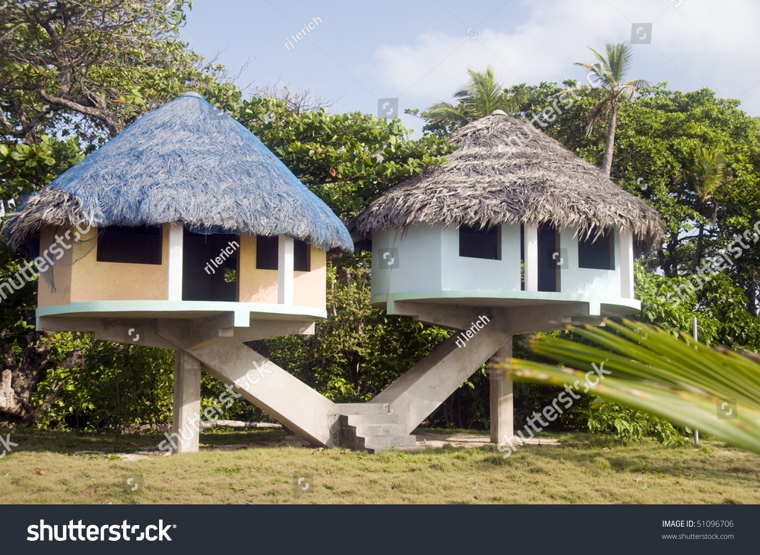 Thatched Roof Beach House With Outdoor Entertaining Spaces