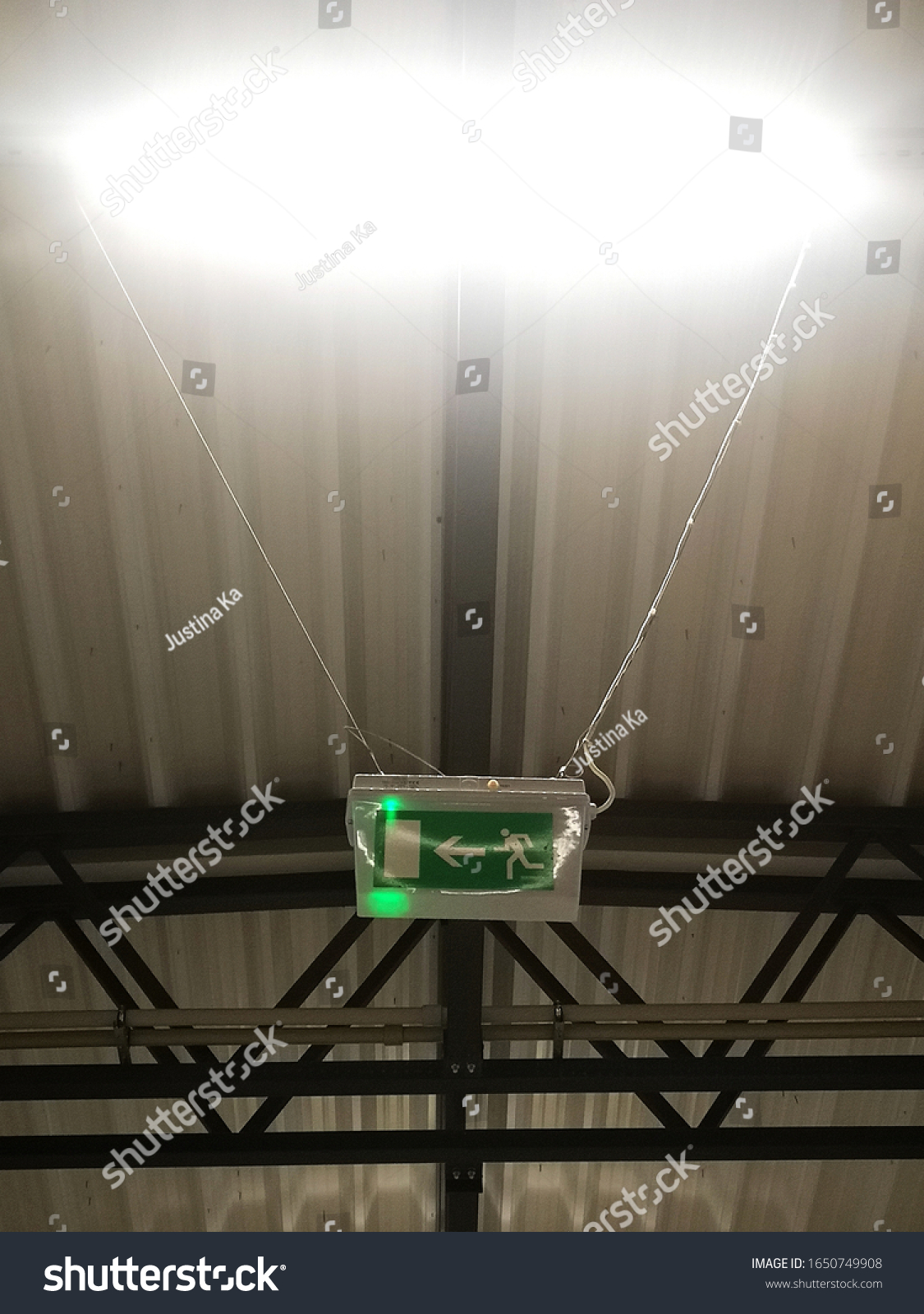 emergency-exit-sign-warehouse-stock-photo-1650749908-shutterstock