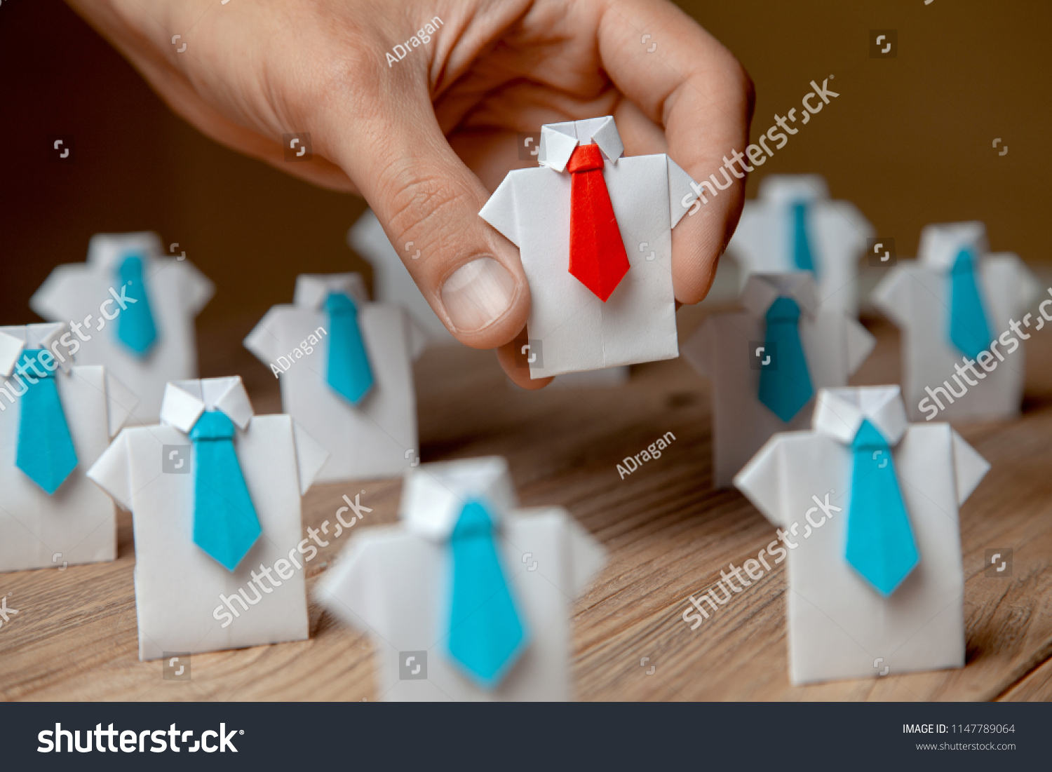 employer-chooses-takes-hand-employee-leader-stock-photo-1147789064