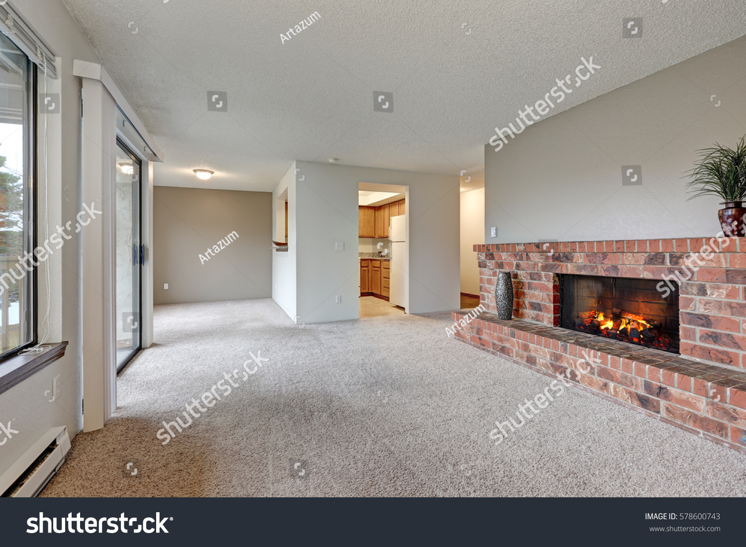Empty Living Room Features White Walls Royalty Free Stock Image