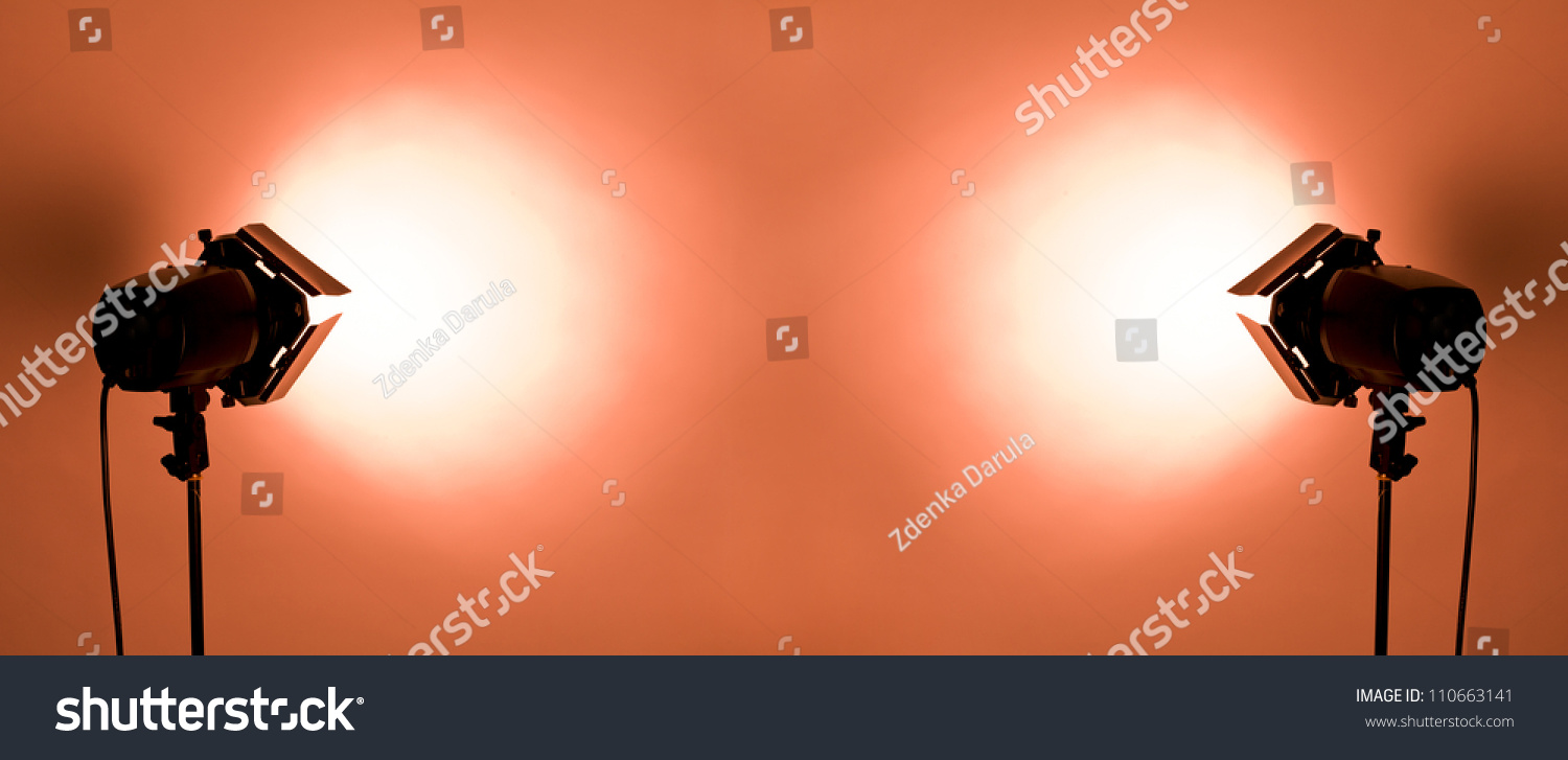 Empty Studio Background And Flash Lights On Light Red Stock Photo ...
