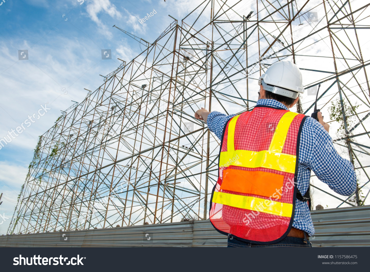engineer speaking walkietalkie point