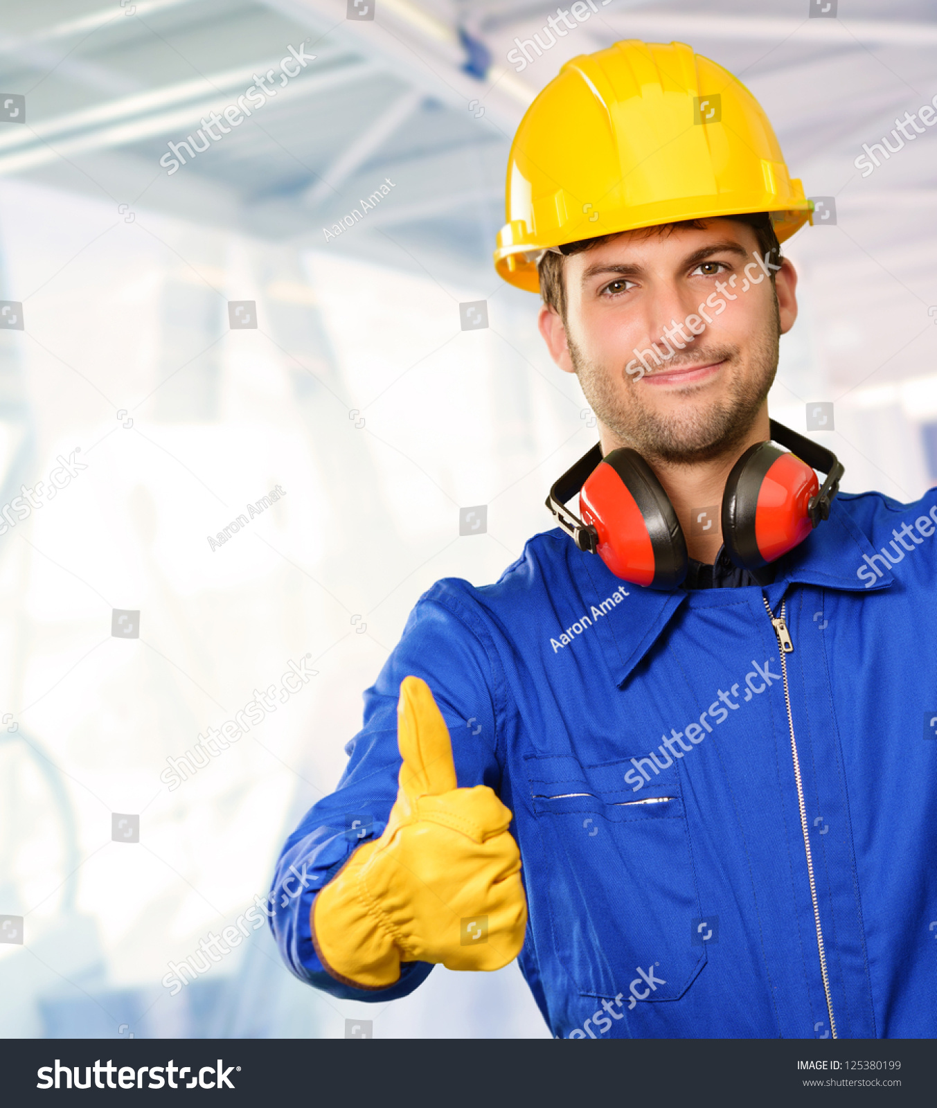 stock-photo-engineer-with-thumb-up-sign-indoors-125380199.jpg
