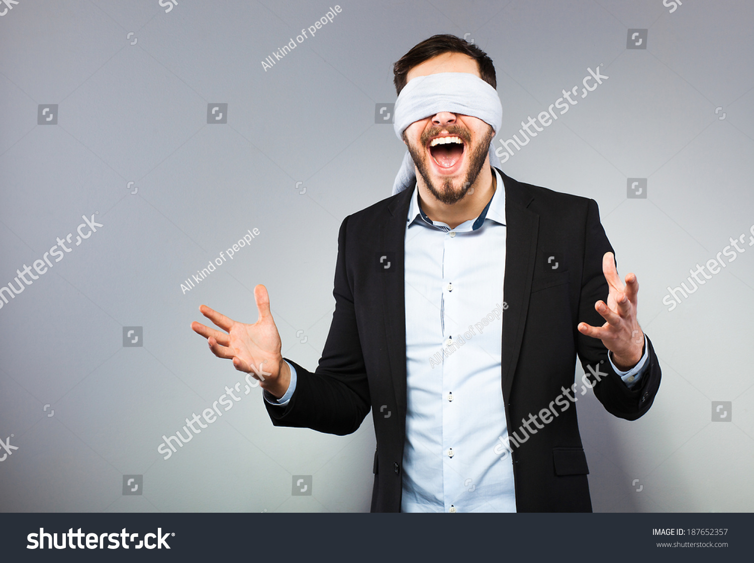 stock-photo-excited-blindfolded-man-in-b