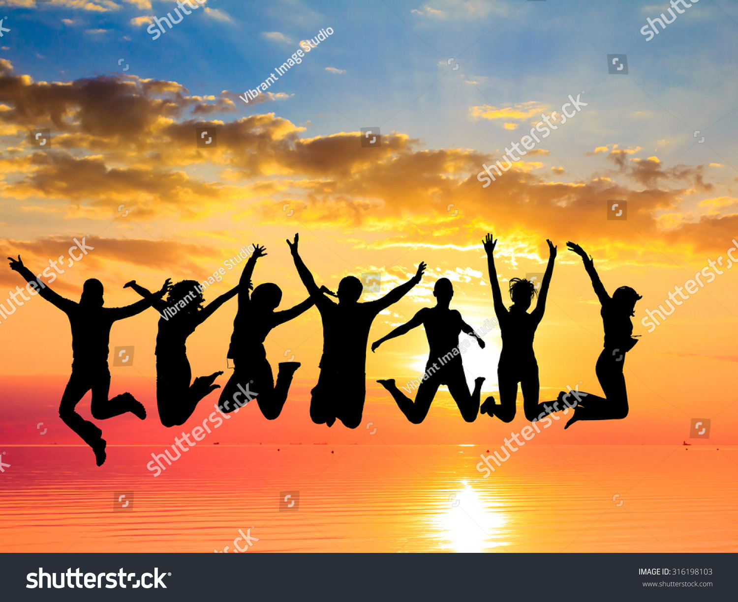 Excited Jumping Over Sunset Stock Photo (Edit Now) 316198103