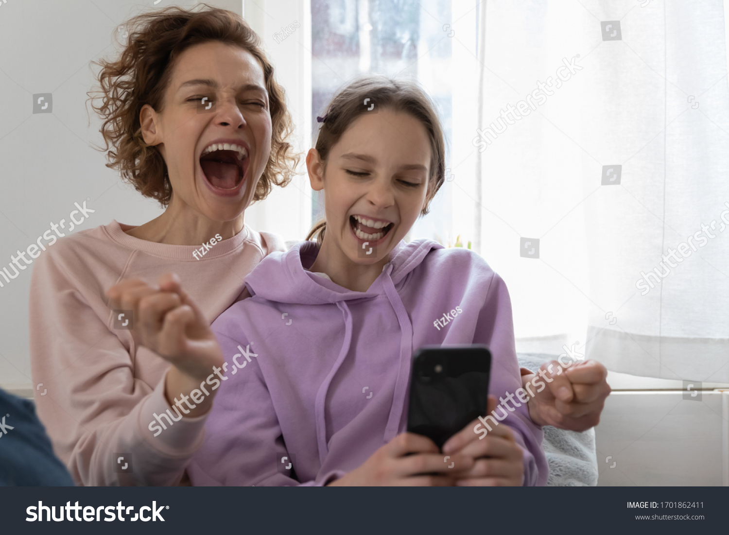 Excited Overjoyed Family Young Adult Mom Stock Photo (Edit Now) 1701862411