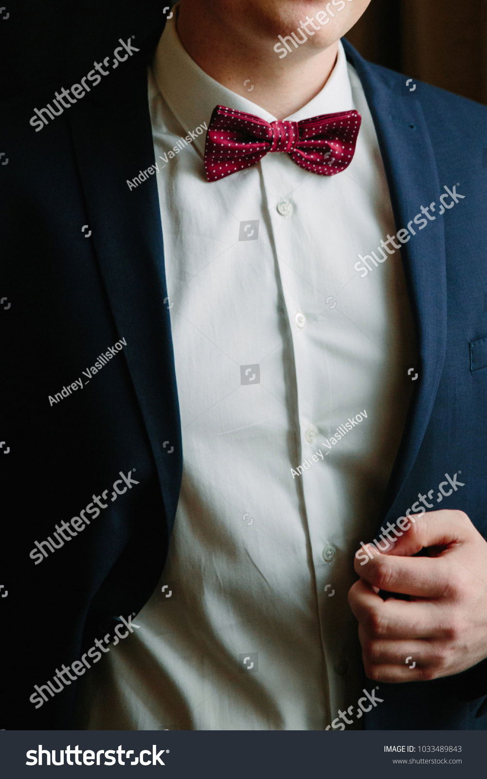 navy suit white shirt burgundy tie