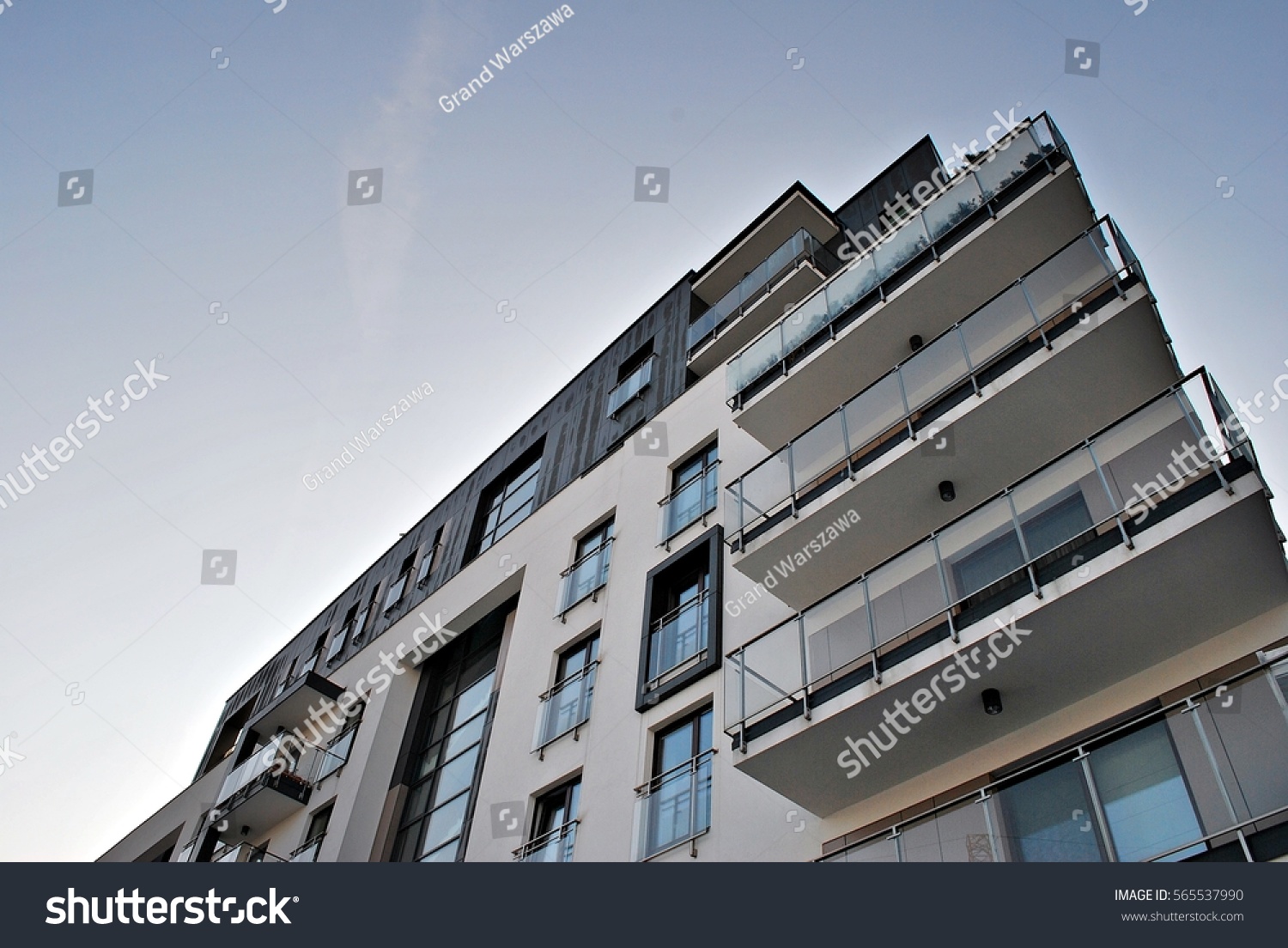 Facade Modern Apartment Building Stock Photo 565537990 - Shutterstock  Facade of a modern apartment building