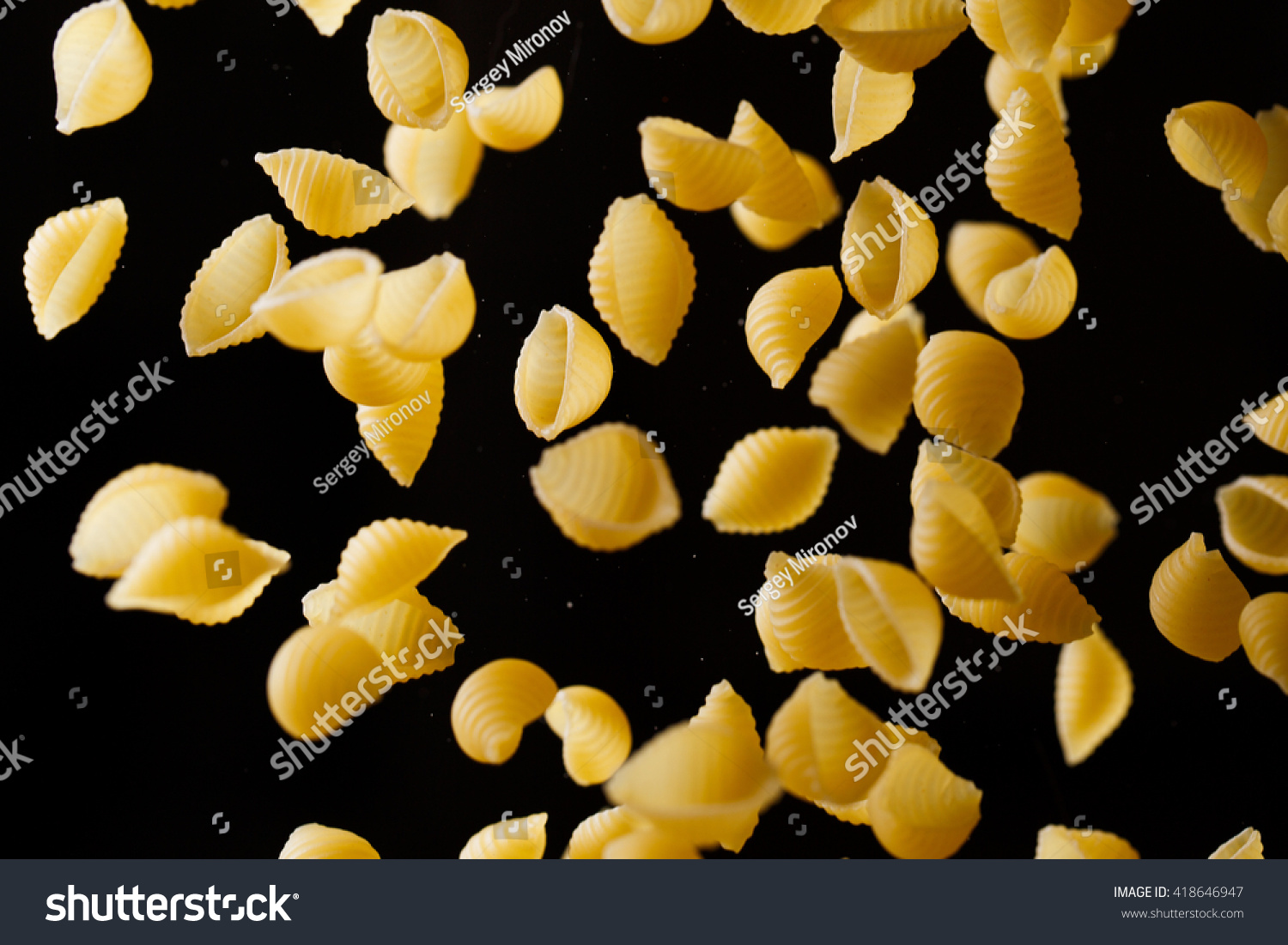 Download Falling Conchiglie Pasta Flying Yellow Raw Backgrounds Textures Stock Image 418646947 Yellowimages Mockups
