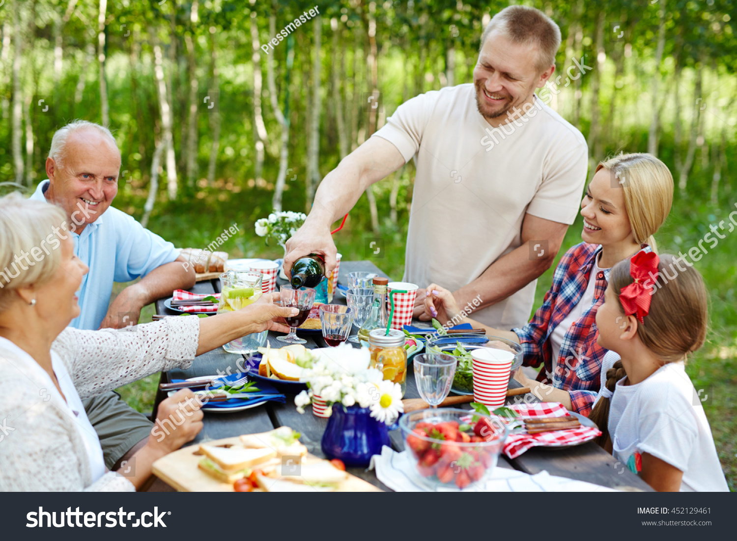 Family Having Dinner Stock Photo 452129461 : Shutterstock