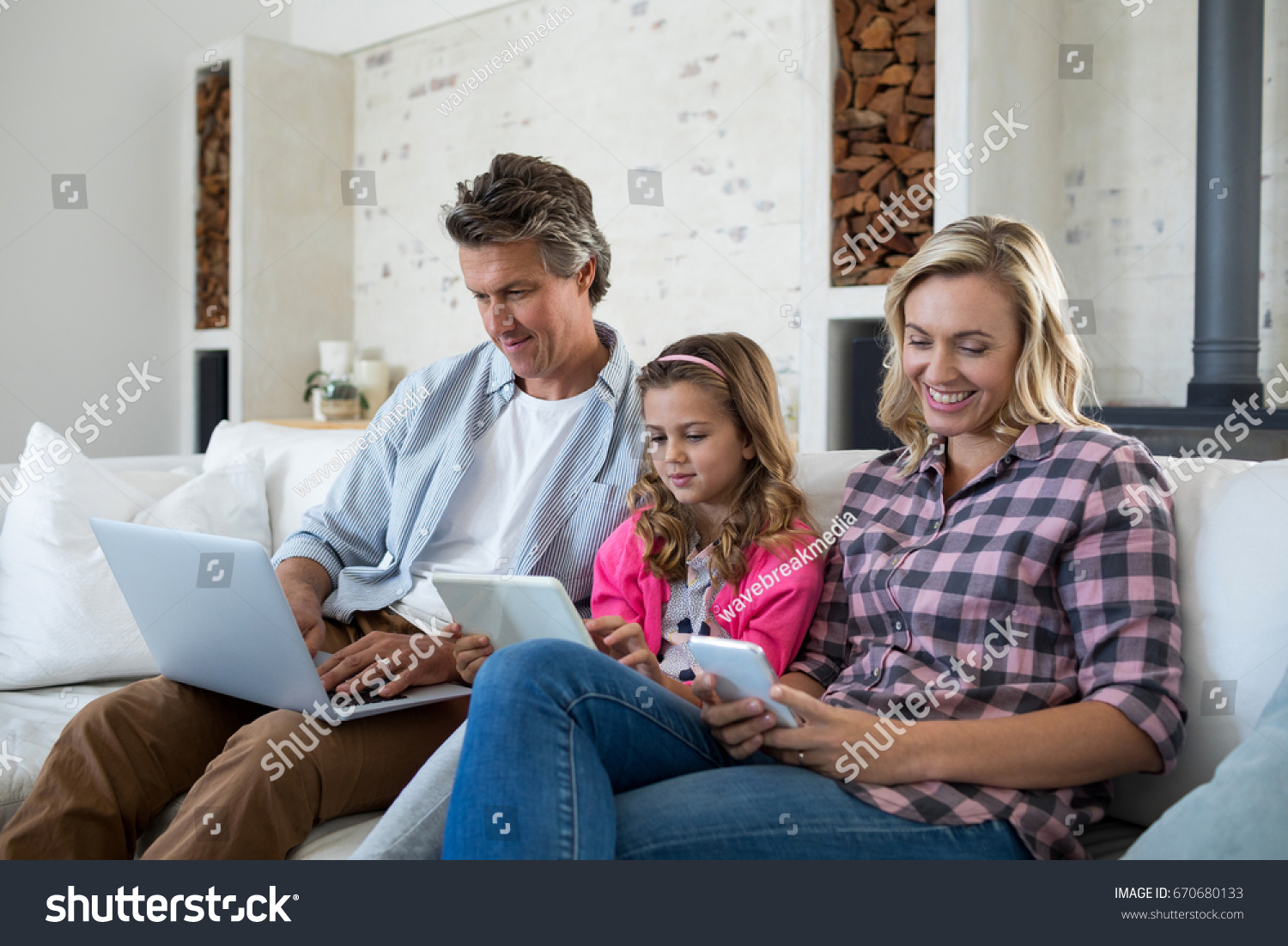 Family Using Laptop Digital Tablet Mobile Stock Photo Edit Now