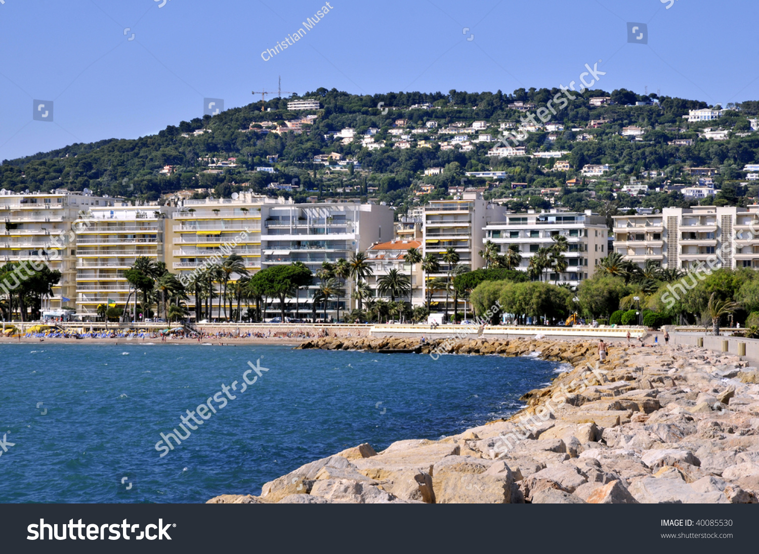 Famous Bay Of Cannes In France With The Beach And Buildings In The ...