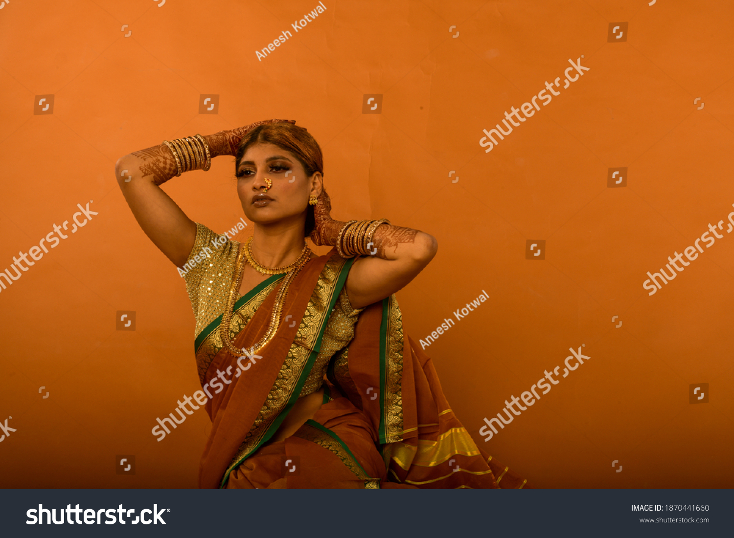 fashion-portrait-indian-woman-copper-colour-stock-photo-1870441660