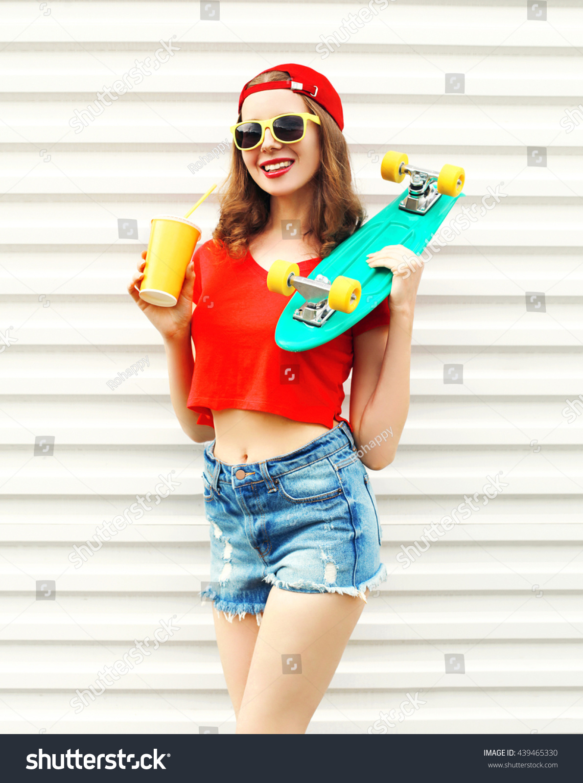 Fashion Pretty Cool Woman With Skateboard And Cup Of Fruit Juice Over ...