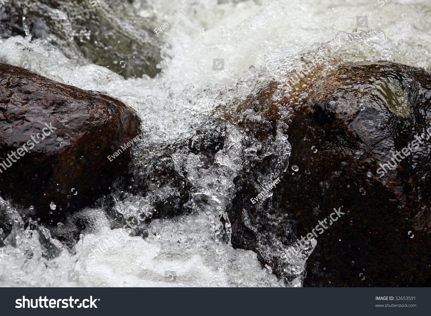 Fast Moving Water In A Stream Frozen With A Fast Shutter Speed Stock ...